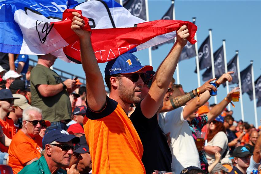 Dutch fan holding flag